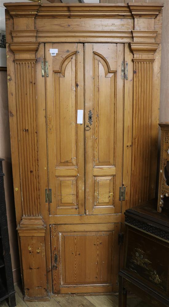 A George III pine corner cabinet, W.101cm H.211cm